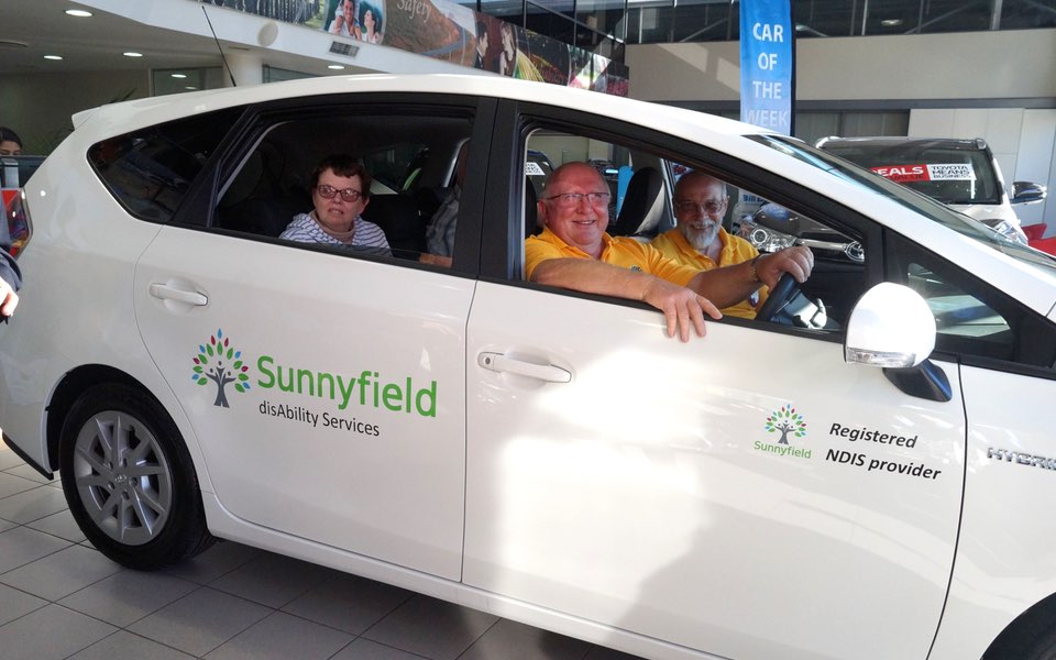 Lions Club members donate car to Sunnyfield